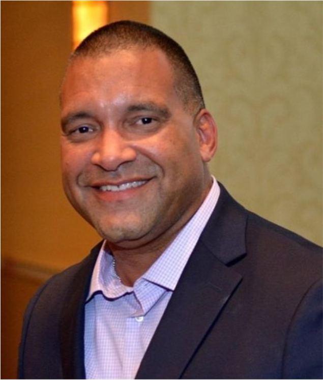 Headshot of Phil Wilkins, Modivcare