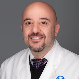 Dr Komrokji