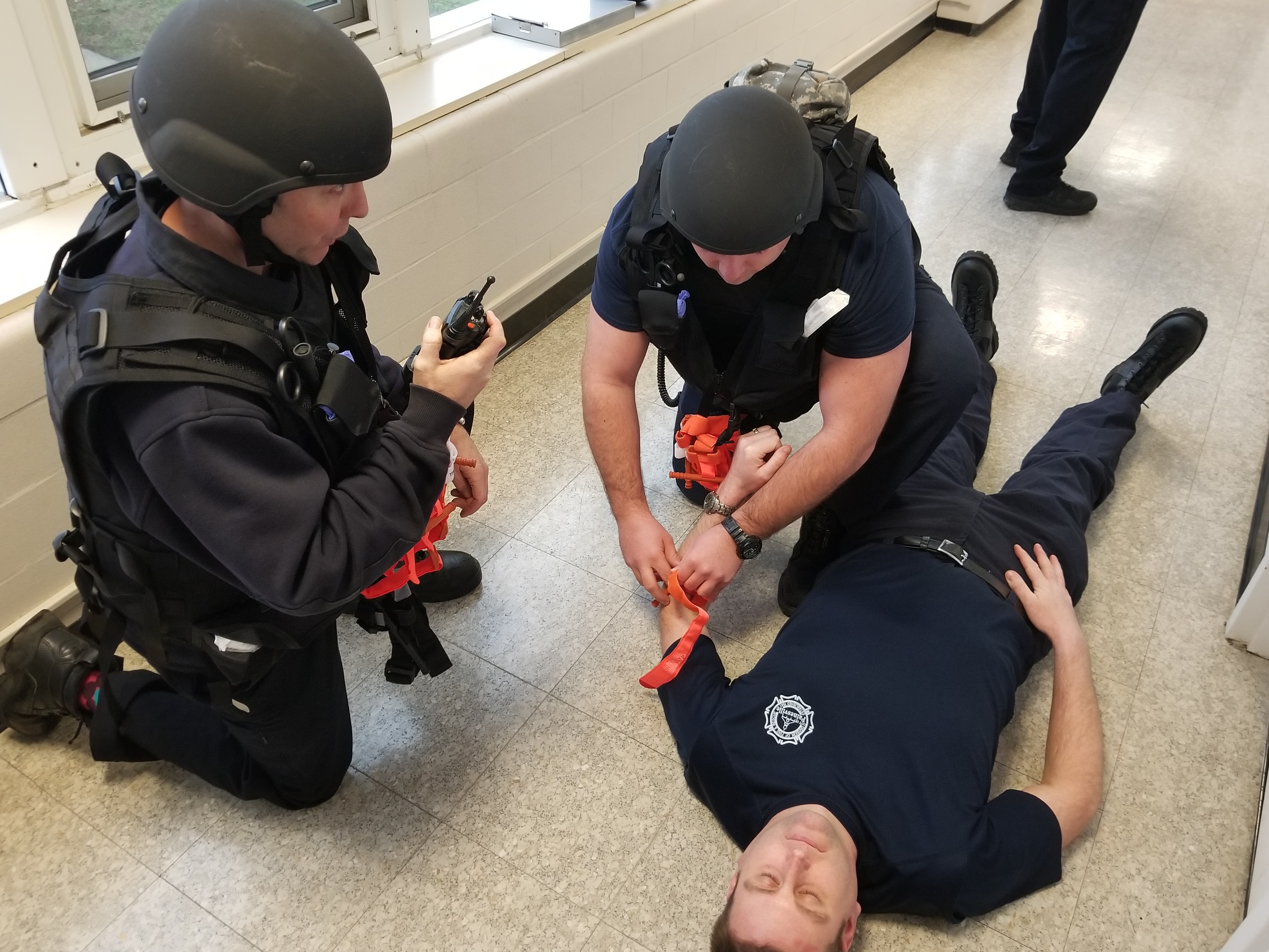 assessing and treating a victim.