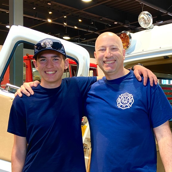 The author and his son, Brett, both firefighters, with the ambulance at the Los Angeles County Fire Museum (Photo: Barry Bachenheimer)