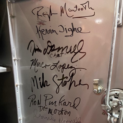 The door to the squad is autographed by cast members.