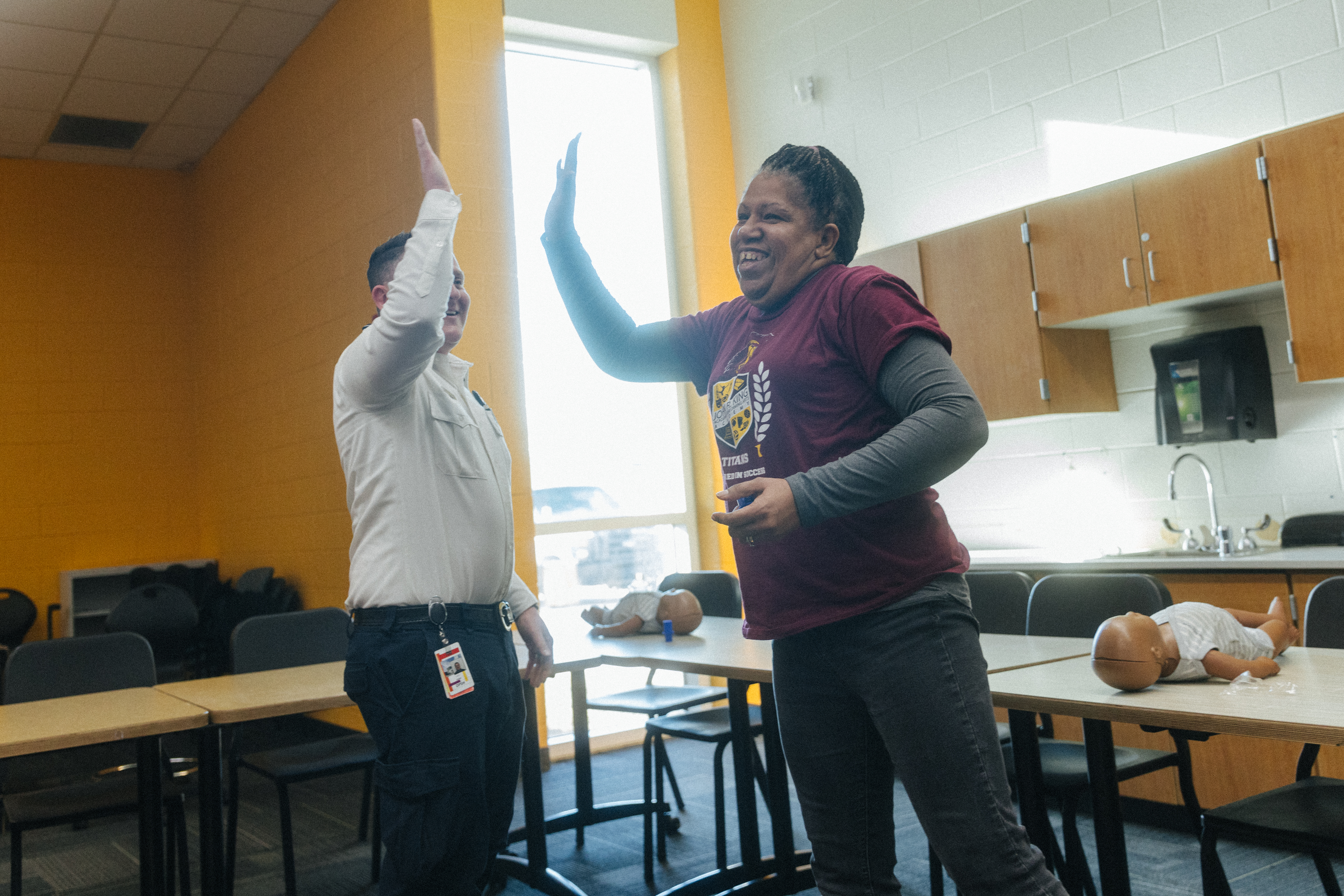 Forbes and teacher high five