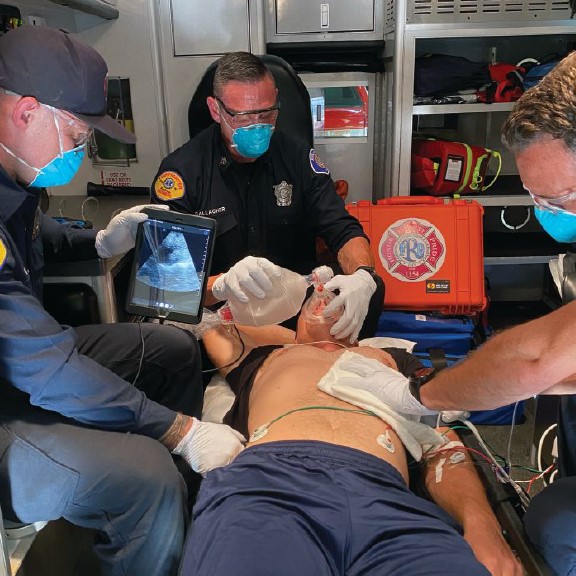 Redlands Fire Department paramedics trial the use of ultrasound while en route to the hospital. (Photo: Redlands Fire Department) 