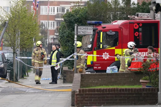 Firefighters responding to a fire in the London suburb of Golders Green on Monday.Alberto Pezzali / AP