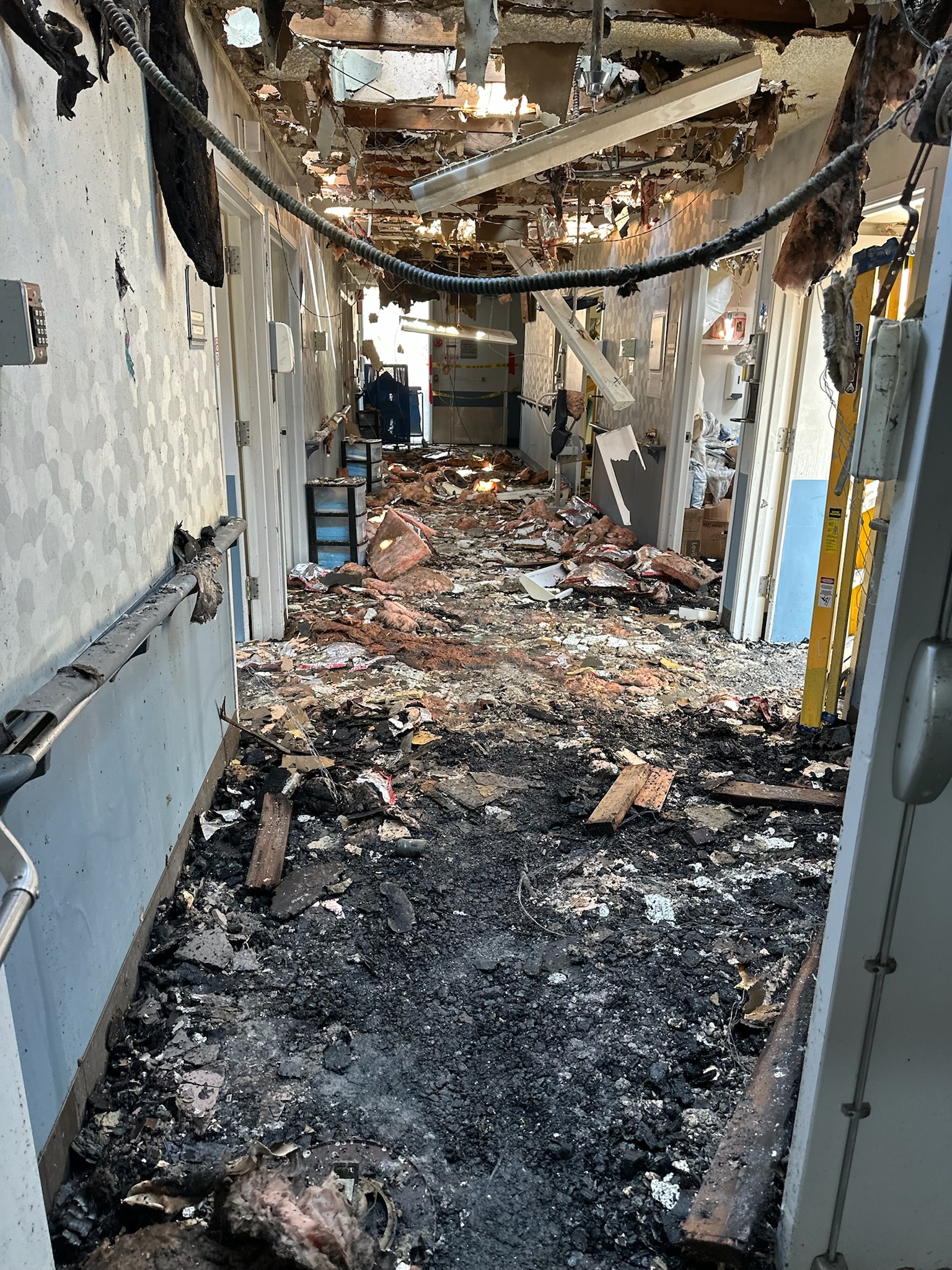 the corridor of a residential home consumed by the Eaton fire, previously evacuated by EMS crews