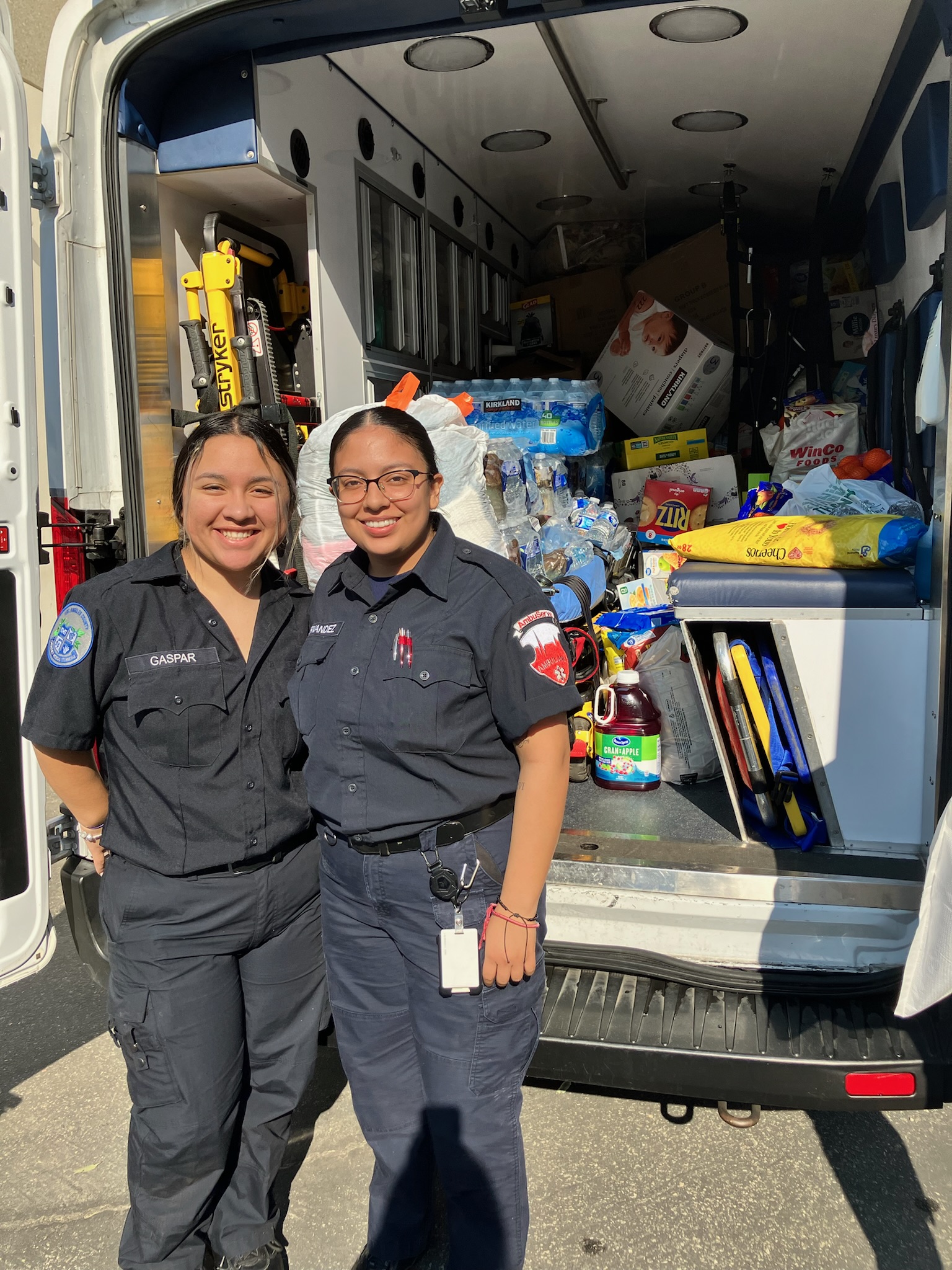 Ambuserve inc and Medic1 crews staff an ambulance used to collect donations to support those displaced in the Eaton Fire