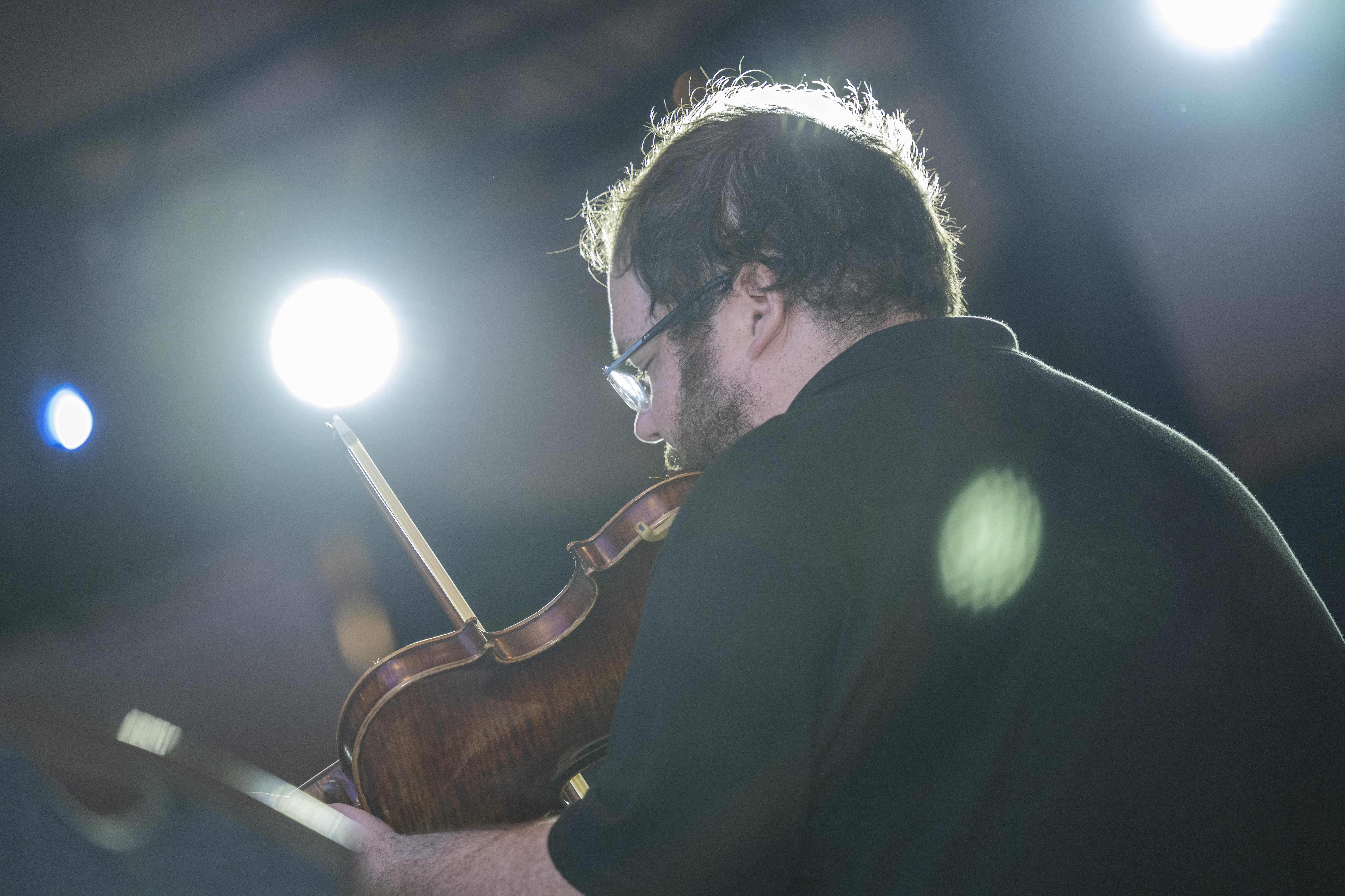 A violinist in the Me2/ Boston String Orchestra during their performance Friday night at the 35th Annual Psych Congress in New Orleans, Louisiana.