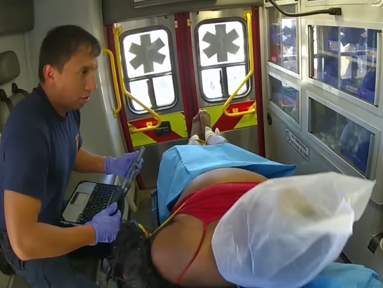 An image from the bodycam video released by Dallas police shows Hall in the ambulance. (Photo: Dallas Police Department/YouTube) 
