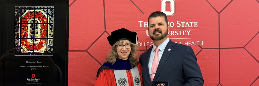 Chris Gage appears alongside his doctoral advisor, Amy Ferketich, PhD, after receiving the Doctoral Research Award from The Ohio State University College of Public Health