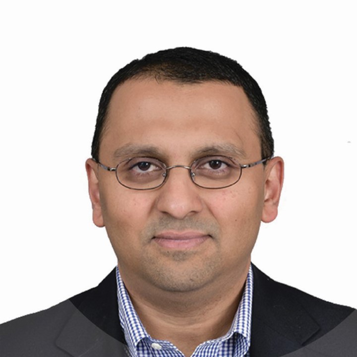 Headshot of Karthik Ganesh.