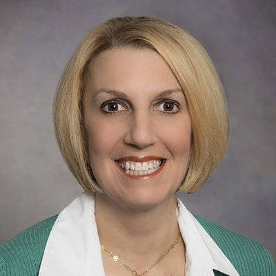 Headshot of Kim Glenn, SVP of government health plans, HHAeXchange