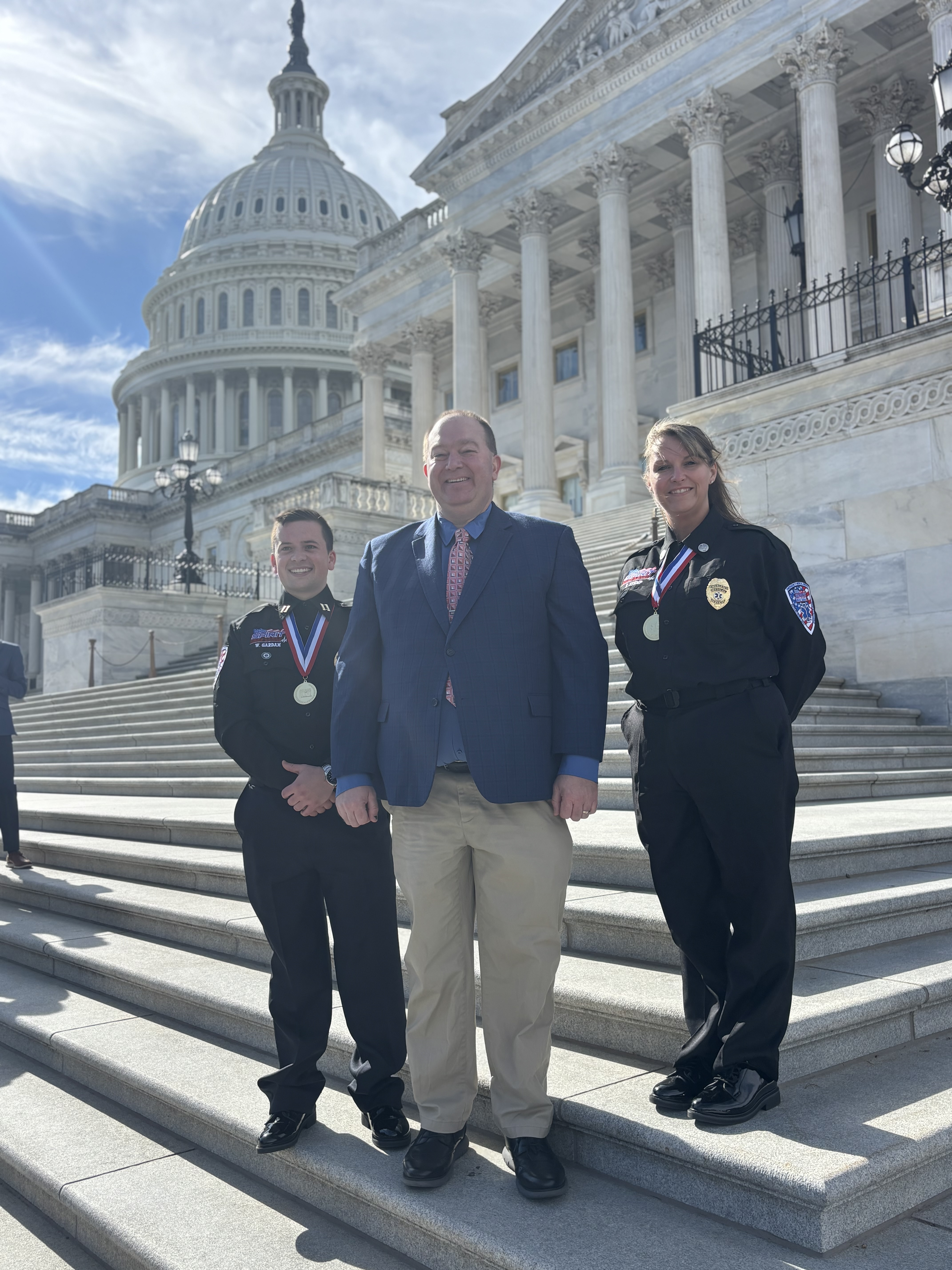 From left to right, CDST Director Sarah Stump, President & CEO Brian K. Hathaway, and Captain Paramedic Will Gardam of Spirit EMS stand on the steps of the U.S. Capitol during the American Ambulance Association Stars of Life event in Washington, D.C., representing their organization and the EMS profession on a national stage. News