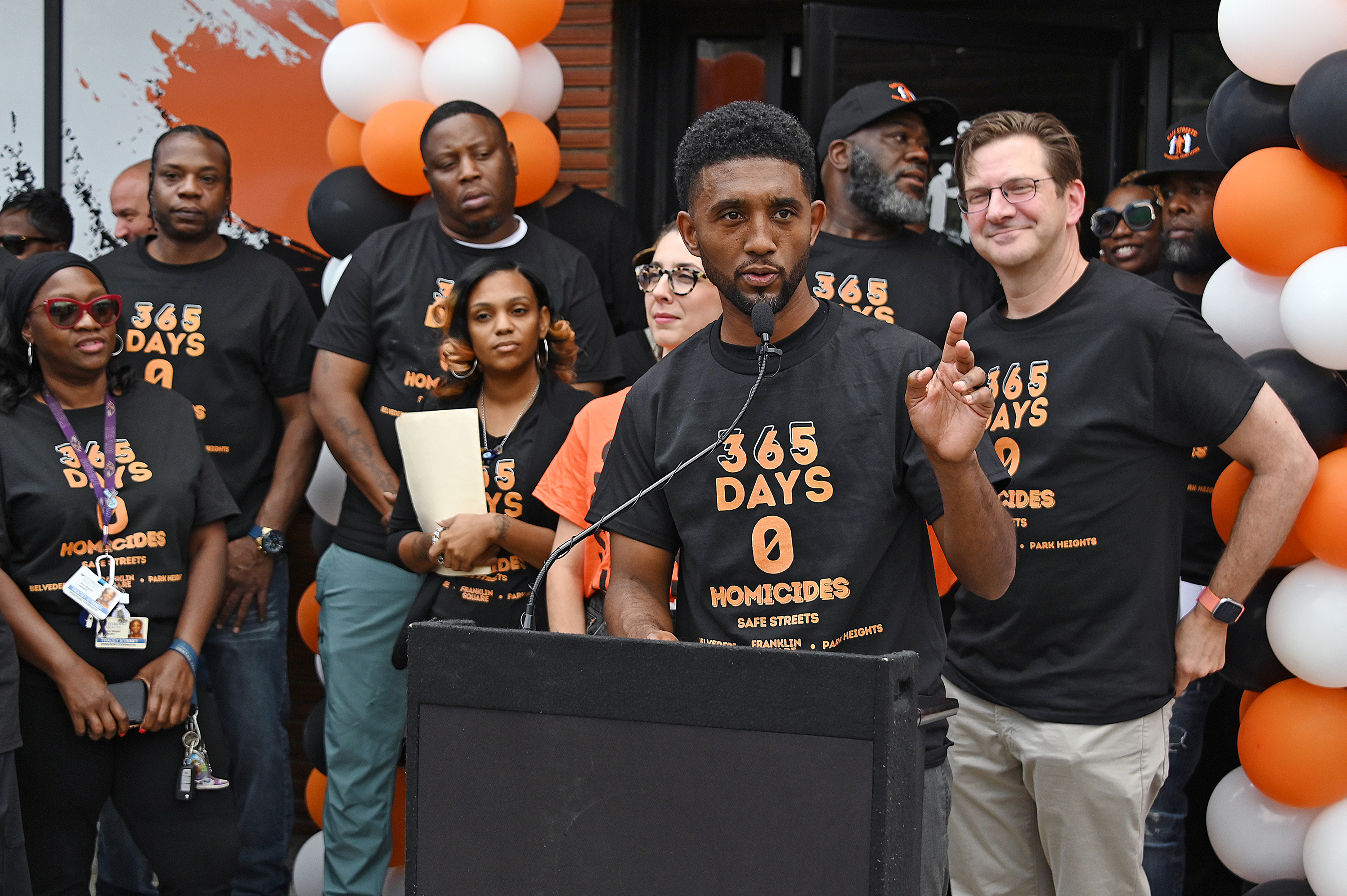 Mayor Brandon Scott marks the efforts of Safe Streets Belvedere, Park Heights and Franklin Square to achieve over 365 days without a homicide in their catchment zones. (Kim Hairston/The Baltimore Sun/TNS) 