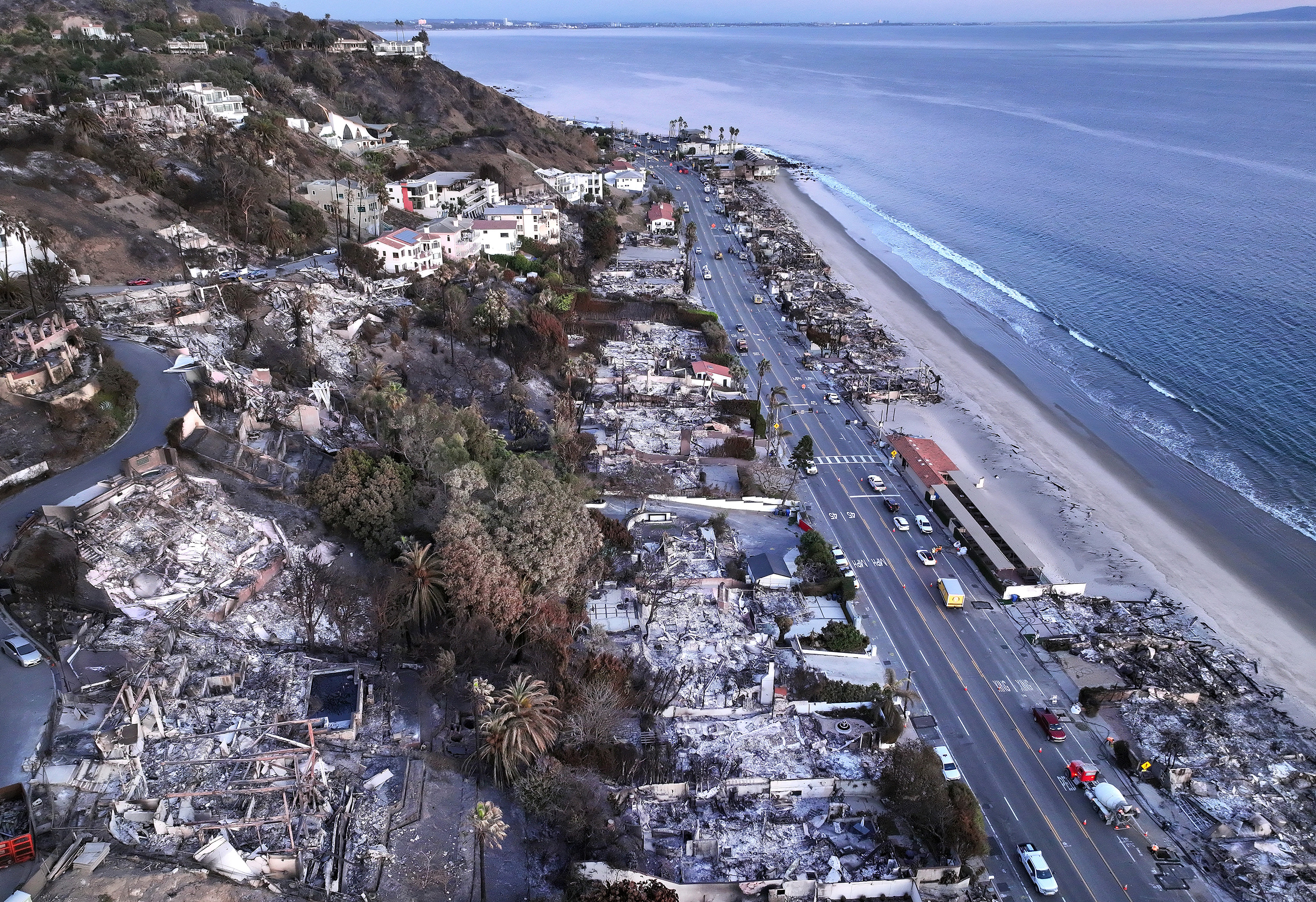An aerial view of homes along the beach that burned in the Palisades fire as wildfires cause damage and loss through the Los Angeles region on Jan.15, 2025, in Malibu, California. (Mario Tama/Getty Images/TNS)