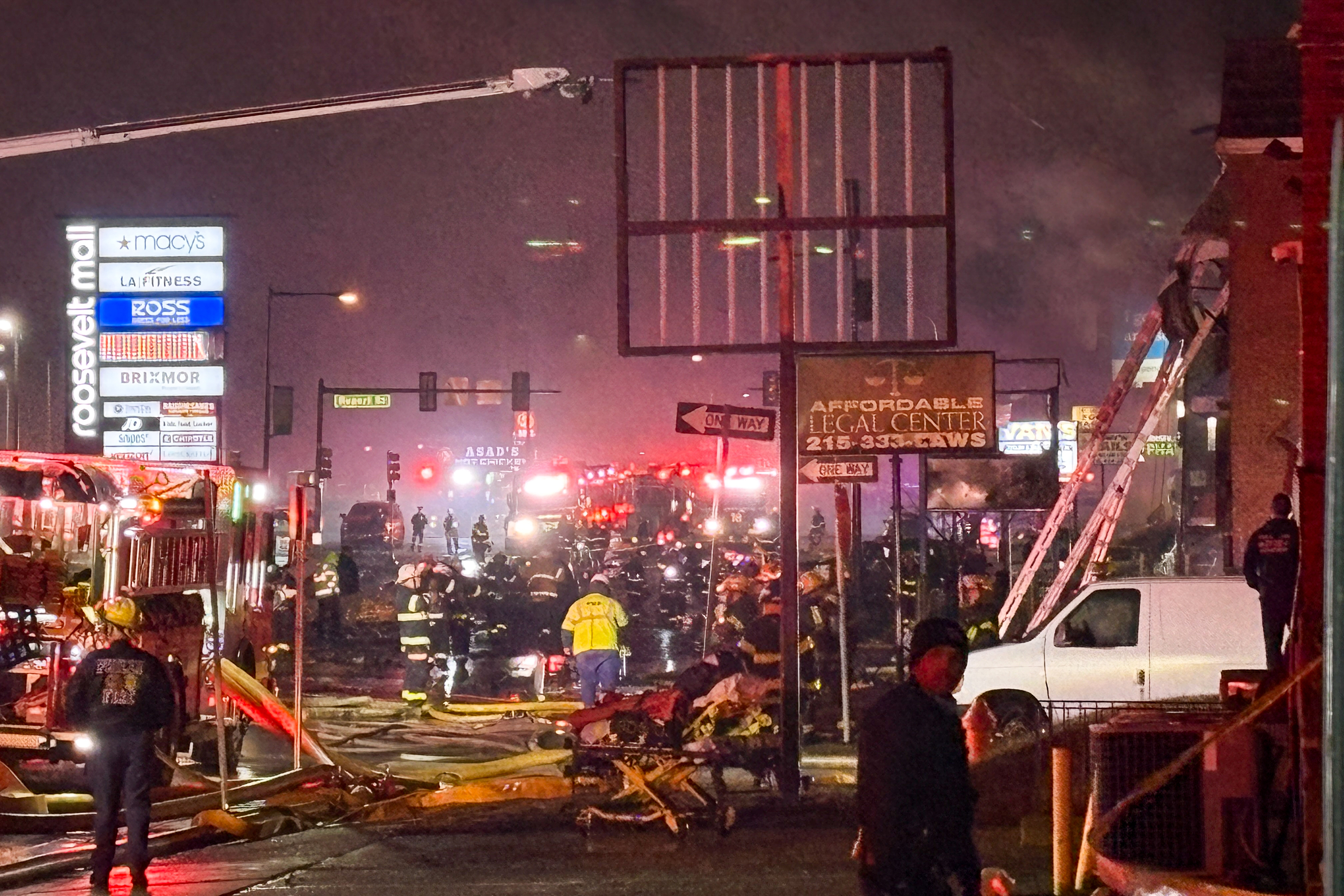 First responders after a plane was reported to have crashed near Roosevelt Mall on Friday, Jan. 31, 2025, in Philadelphia. (Elizabeth Robertson/The Philadelphia Inquirer/TNS) 
