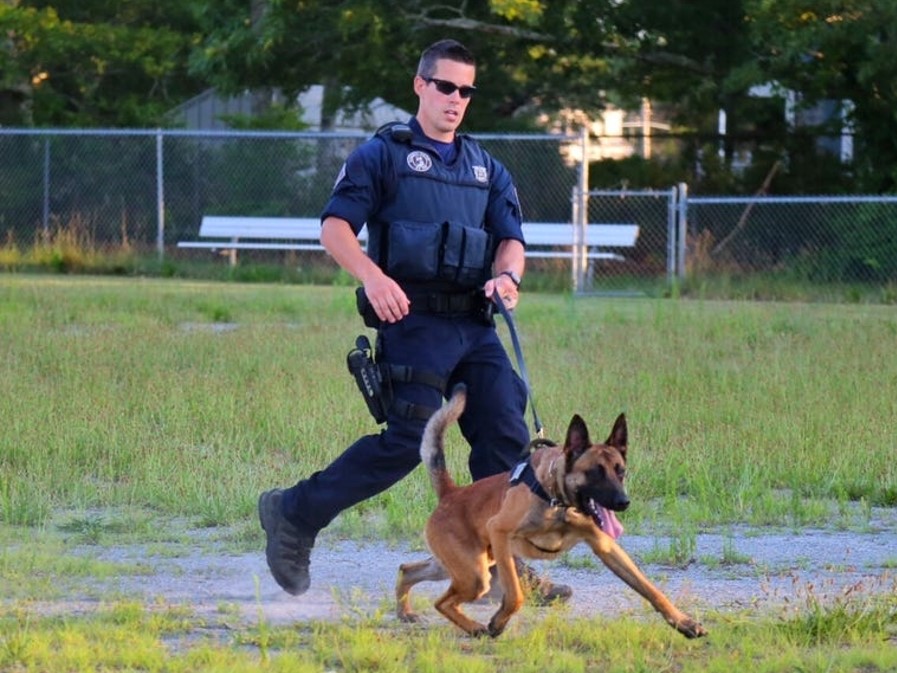 Slain Yarmouth officer Sean Gannon and his dog, Nero, whose wounding inspired the new Massachusetts law. 