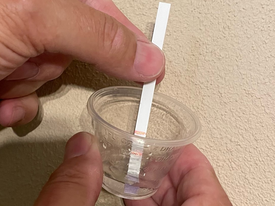 Use of a fentanyl test strip