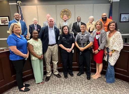 LaGrange Police Officer Mealer joins LaGrange Mayor Jim Arrington and members of the LaGrange City Council to honor the first responders, dispatchers, and hospital staff that helped save her life.