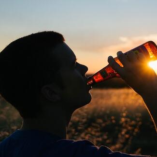 man drinking beer