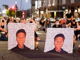 People gather in West Hollywood, Calif., in August 2020 to demand justice for Elijah McClain on the anniversary of his death. (Photo: Rich Fury/Getty Images-TNS)