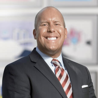 Headshot of Troy Jelinek, Icario