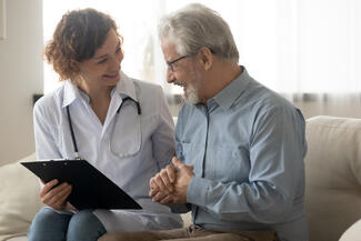 Elderly patient and his doctor