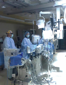 Dr. Seto (right) and a fellow in the cath lab.