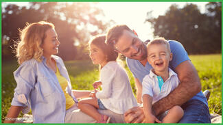 Family playing together outside