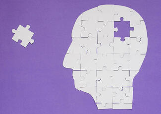 Which factors were associated with young-onset dementia risk?