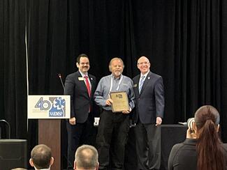 Mike Taigman Honored with the Keith Neely Outstanding Contribution to EMS Award
