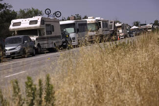 A line of campers along Jefferson Boulevard in Marina del Rey in 2023. Los Angeles County’s Pathway Home program targets RV encampments, cleaning up the RVs and moving residents into interim or permanent housing. (Genaro Molina/Los Angeles Times/TNS)