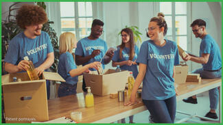 Adults doing volunteer work together