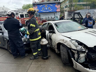 Training at the Rock FDNY training camp for car crash scenarios