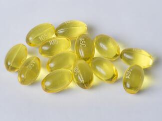 100 mg generic benzonatate capsules, small, round, golden gel capsules