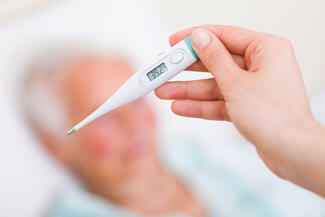 Thermometer showing high fever