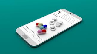 Rx pad in the shape of a cell phone with pills on the screen