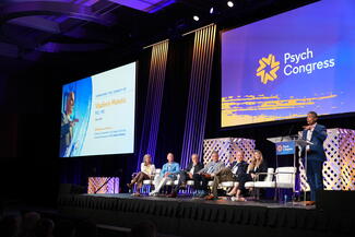 Speakers on stage at the Vladimir Maletic memorial session