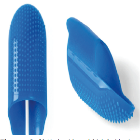 photo of finger-mounted debridement tool