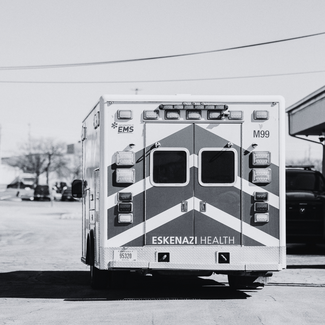 black and white ambulance representing end of EMS career