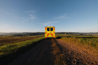 Ambulance on a dirt road
