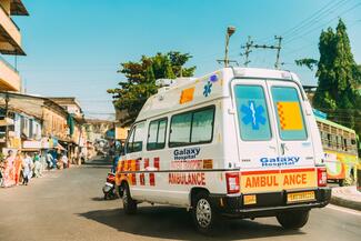 Mapusa, Goa, India. Ambulance Car Moving With Siren