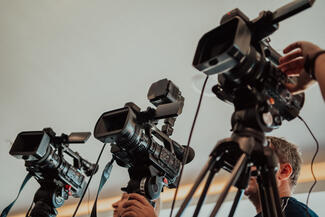 Cameras for a press conference