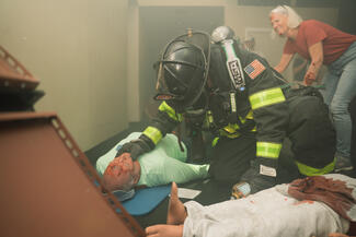 North Port Fire Rescue crew members  assess volunteer patients during a mass casulaty incident training exercise  in 2025.
