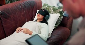 A patient receives psychedelic-assisted therapy