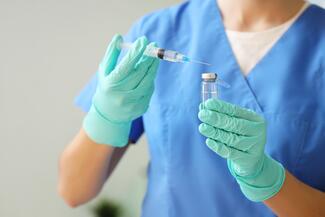 Doctor with syringe