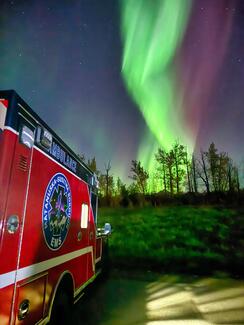 Ambulance in the northern lights-Ty Clark