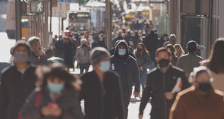 crowded street during covid