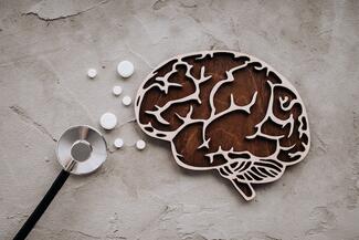 a stethoscope, pills, and brain