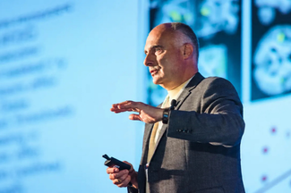 Vladimir Maletic presents on stage