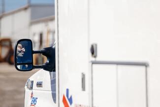 Smiling Young Medic in an ambulance